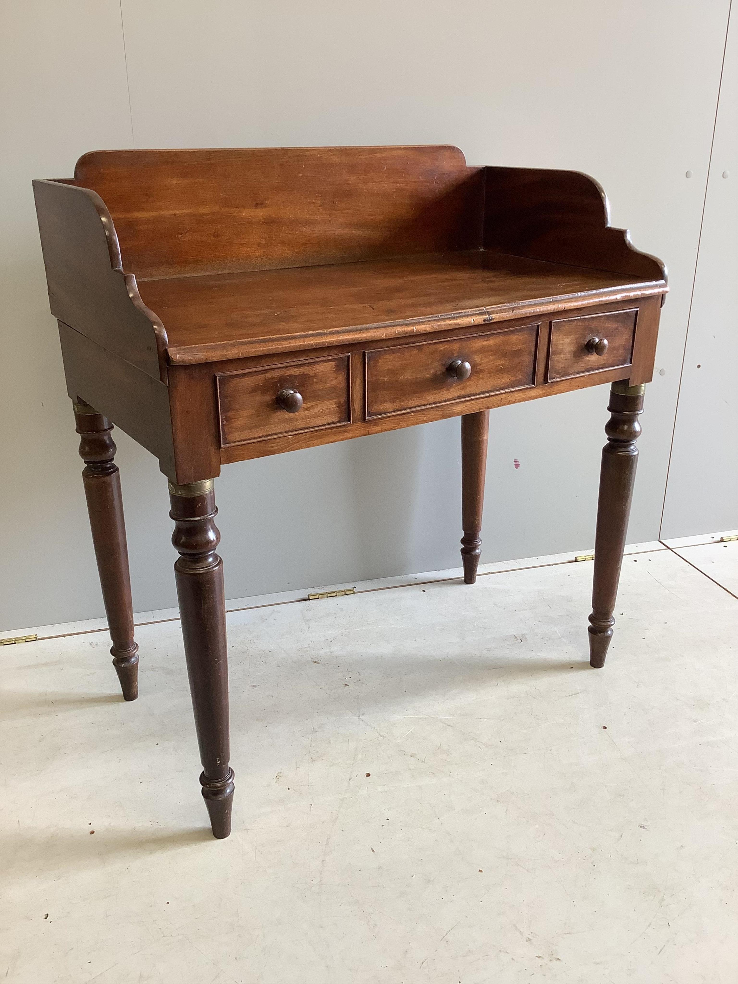 An early Victorian mahogany washstand, width 88cm, depth 49cm, height 95cm. Condition - fair